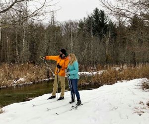 couple cross country skiing in walloon lake michigan