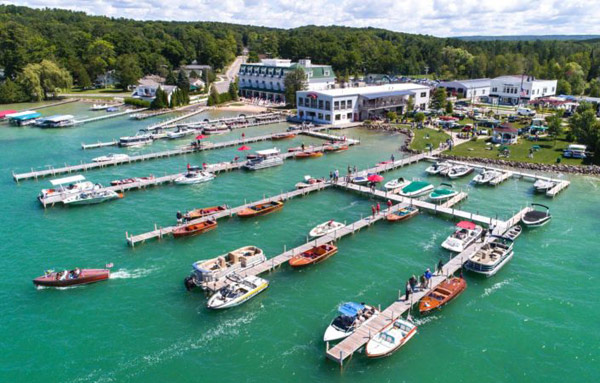 summer in walloon lake with boats at boat docks